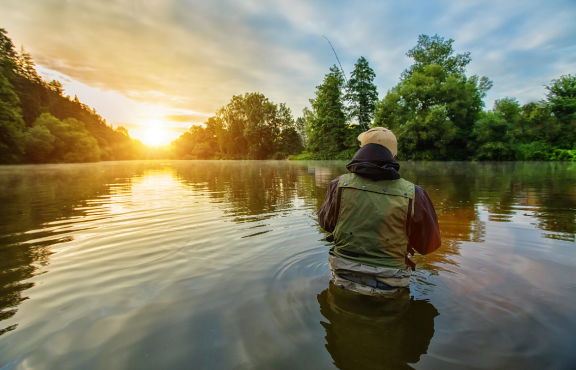 Fishing at sunrise on a lake near Mid America Lodge
